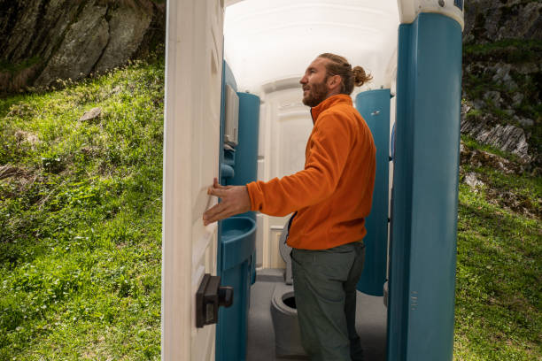 Porta potty delivery and setup in Wolverine Lake, MI